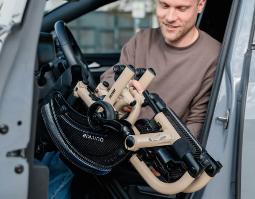 Side profile of the Quickie QS7 Rigid wheelchair in matte black finish