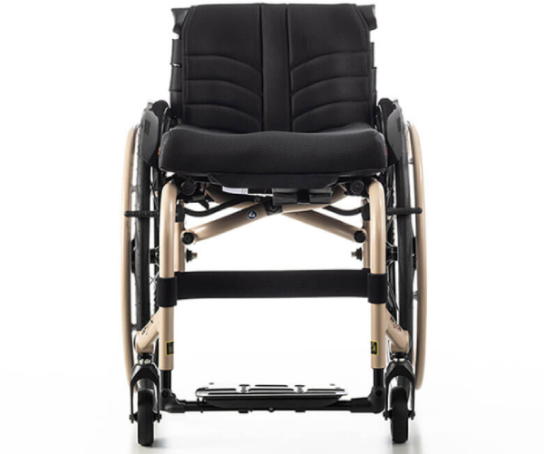 Quickie QS7X folding wheelchair being easily loaded into a compact car trunk demonstrating lightweight portability